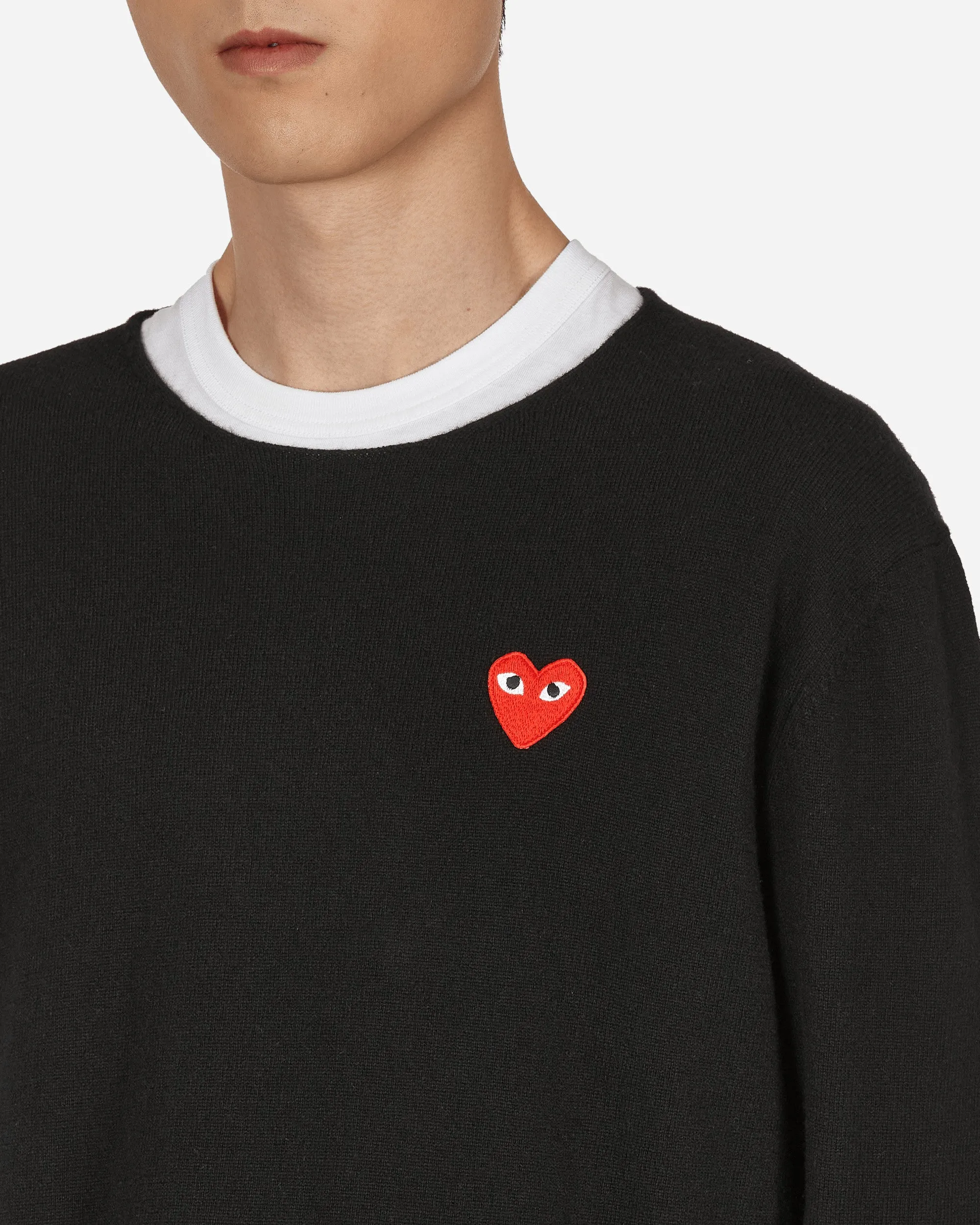 Pull à motif cœur noir